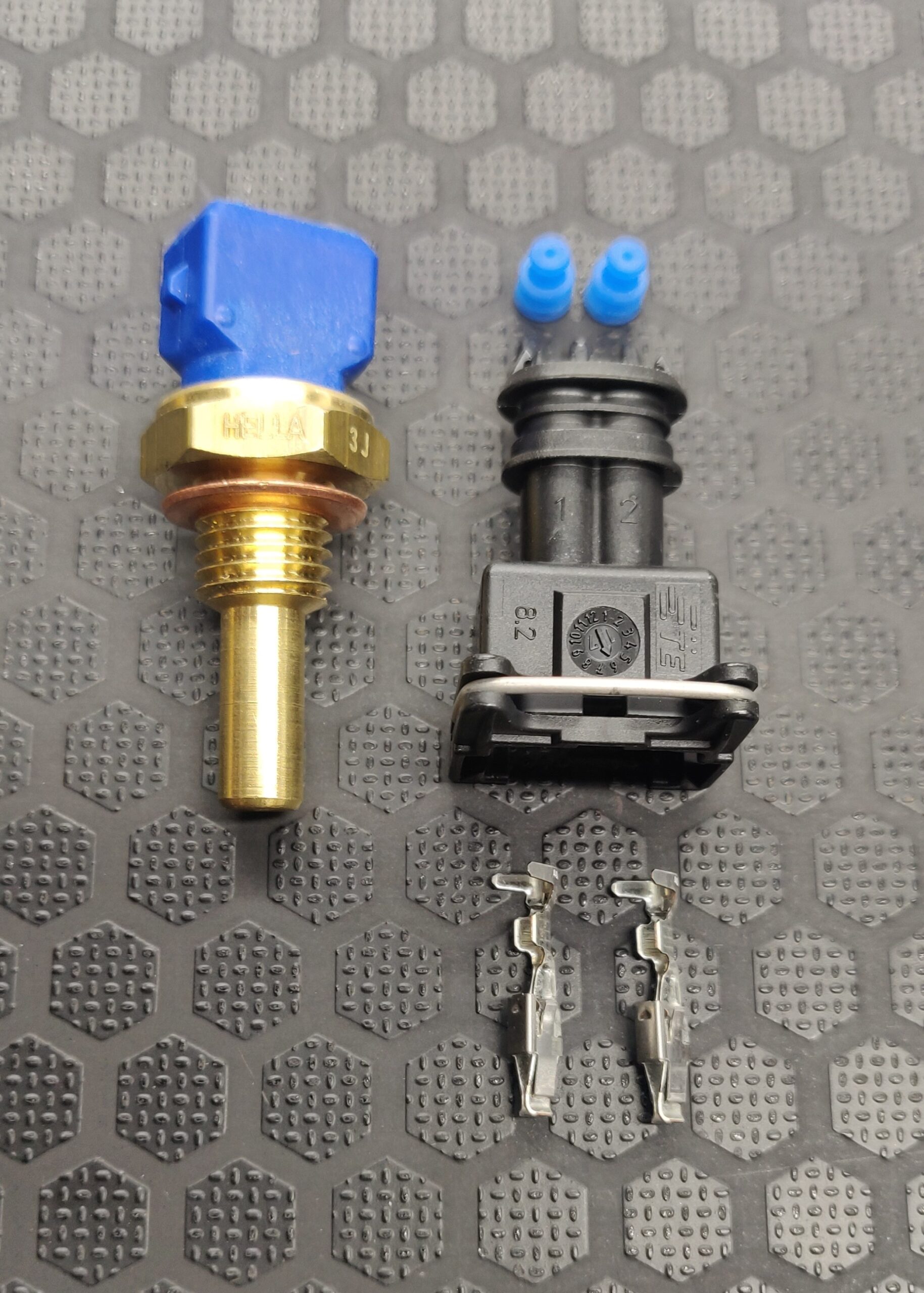 Coolant temperature sensor with plug - Hella 6PT 009 107-361, Bosch 0280 130 026