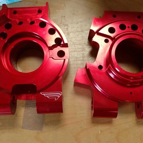 Billet Aluminium Noble M12 GTR rear uprights, CNC machined, Red anodised